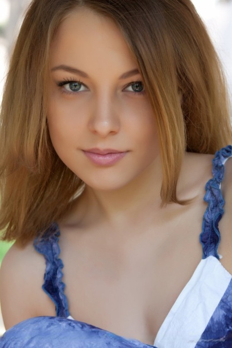 Smiley faced teen Nikia A removing dress for outdoor glamour spread 79517538