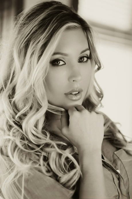 Famous pornstar Samantha Saint shows off her pretty face while modeling solo 27203513