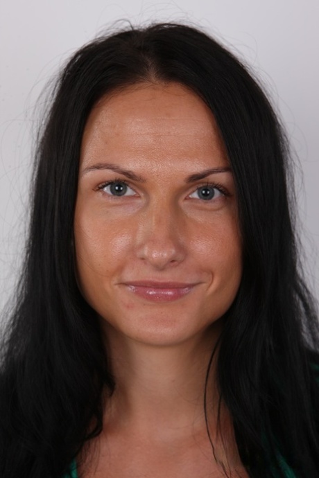 Black haired amateur Zuzana takes a seat after undressing to stand naked 88397066