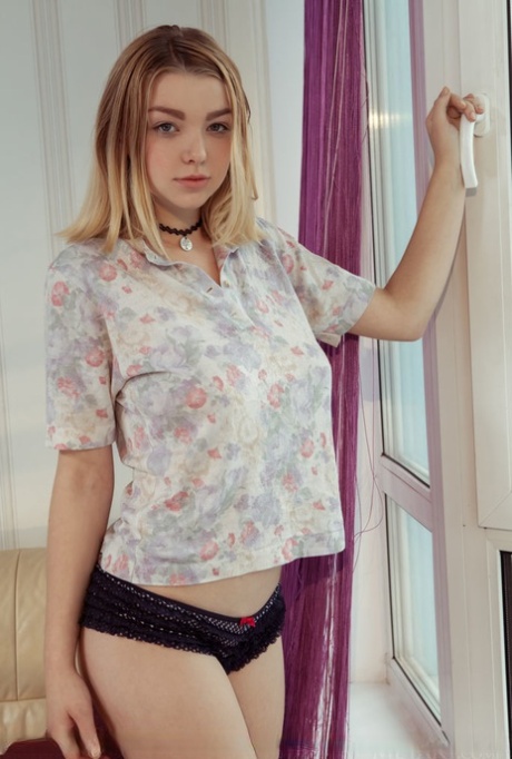 Dirty blond teen Daniel Sea unveils nice tits before displaying her yummy twat 40241395