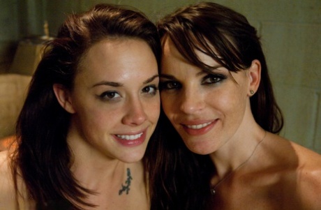 Submissive brunette gets banged by a strapon lesbian and a man as well 10392425