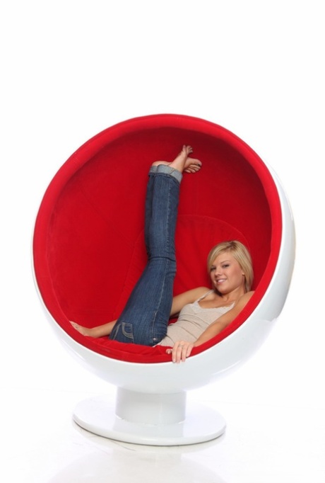 Short haired blonde Tiffany poses barefoot in an egg chair during SFW action 20528945