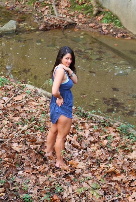 Busty dark haired hottie Christine flashing hot panty upskirt outdoors 34841010