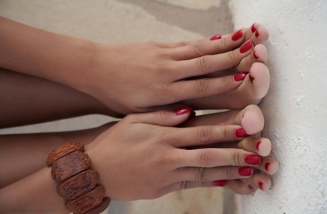 Naked model Angel sports red fingernails and toenails during a solo gig 47564443