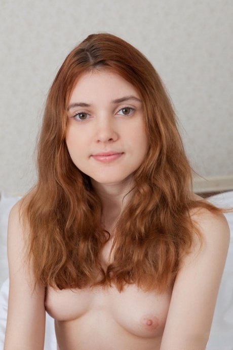 Natural redhead Orabelle Koivu displays her equally natural pussy in the nude 67524236