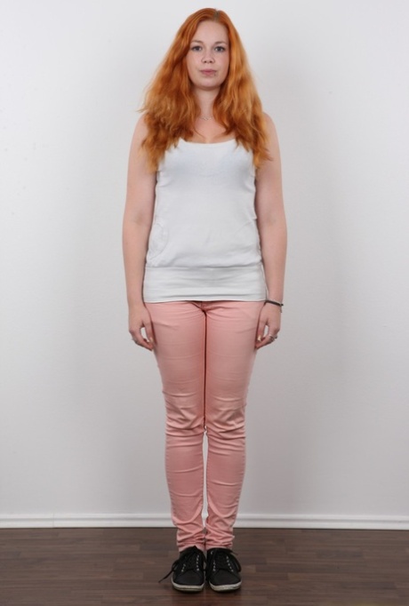 Plump redhead Tereza crosses her legs after standing totally naked 79280299