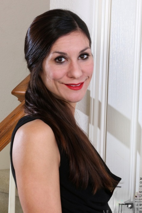 Mature mom Leah Harris undresses prior to masturbating with a vibrator 47426144