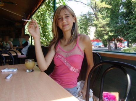 Dirty blonde teen flashes a no panty upskirt inside a restaurant 22710114