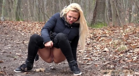 Blonde girl Jena Lovely gets caught taking a piss on a path through the woods 42647680