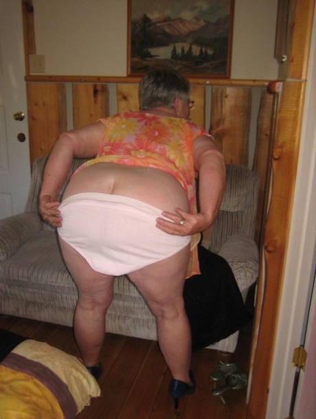 Obese granny Girdle Goddess wakes up from a nap and precedes to strip naked 52167460