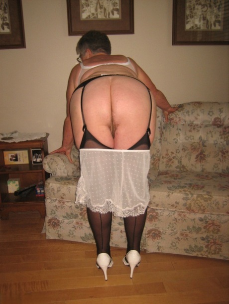 Fat old woman Girdle Goddess slips underwear over her big ass in nylons 90871142