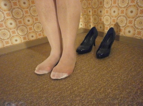 Big ass mature lady Caro posing in white pantyhose and black high heels 67192696