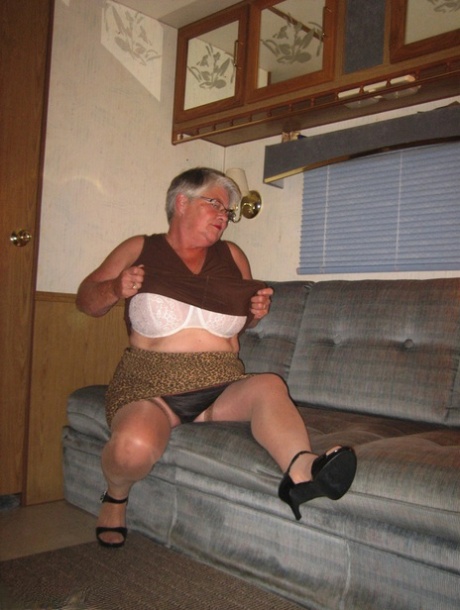 Fat granny Girdle Goddess gets naked on a sofa in stockings and footwear 75988056