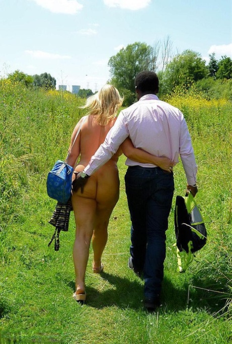Busty blonde slut Chrissy has her pierced pussy exposed on interracial picnic 92050852