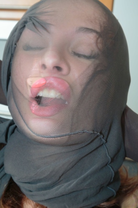 Tall female Eva Berger encases her entire body in pantyhose 17153856