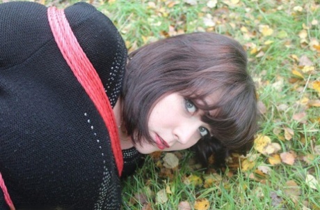 Fully clothed woman is left on lawn while rope tied and cleave gagged 36268642