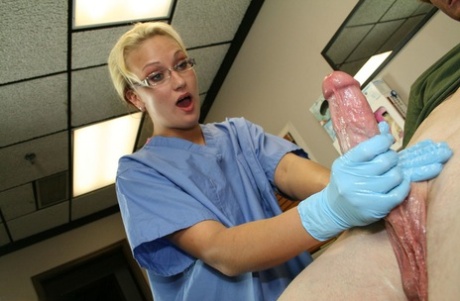 Blonde nurse in latex gloves jerks on a man's dick while examining his balls 57106069