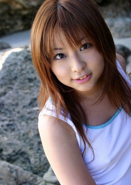 Adorable Japanese girl Miyu Sugiura frees sand clad ass while getting naked 51528518