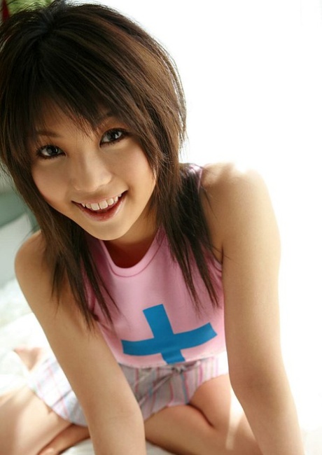 Adorable Japanese teen Azumi Harusaki bares her firm tits and hairy twat 86976213