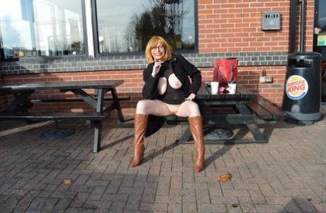 Older woman Barby Slut flashes while out and about in the British Isles 97227590