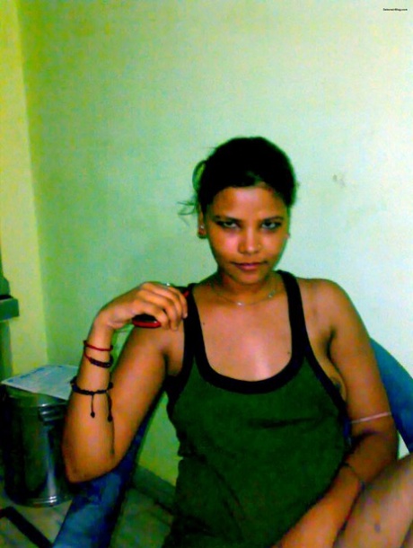 Indian girl has her boobs groped while being fucked missionary style on a bed 51783047