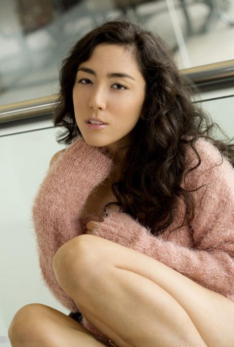 Asian teen Crystal Wings slips off a sweater and panties to pose naked 58216465