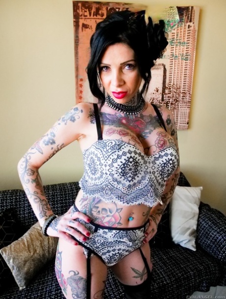 Tattooed chick Megan Inky sports cum on her face after a double penetration 17158364