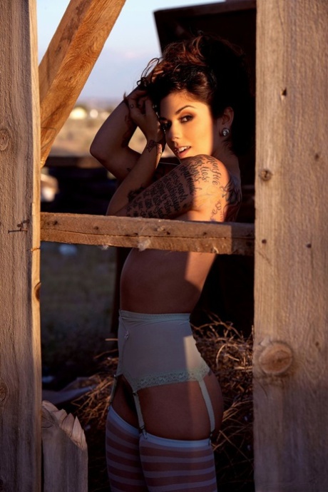 Hot model Kaya Jane poses in a garter belt and hosiery at an abandoned site 87331216