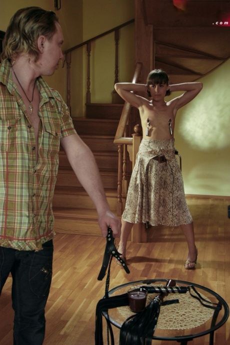 Female slave grimaces while being tortured prior to giving oral sex 80707680