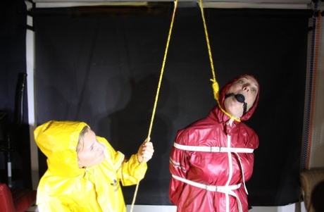 Submissive lesbian is fitted with a noose while ball gagged and tied up 46386652