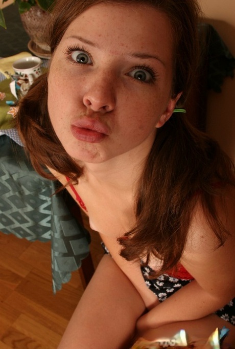 Cute young girl tugs on her pigtails before getting completely naked 33757688