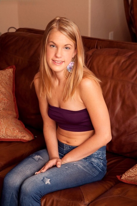 Sweet teen Rebecca Ivy removes tube top and jeans to model in the nude 92671456