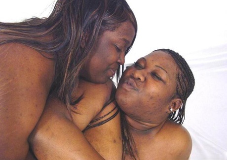Big black women expose their breasts while wrestling each other 64249362