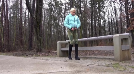 Blonde chick Vanessa Hell gets caught taking a piss against a public railing 27370844