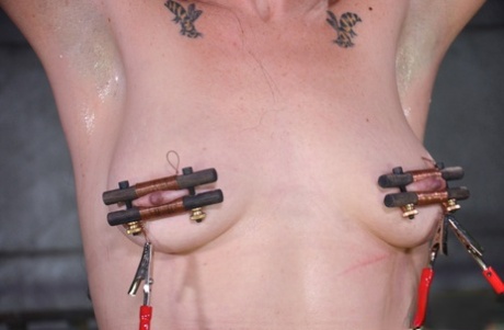 Gorgeous sex slave MILF Siouxsie Q bound with tit clamps on her nipples 13699589