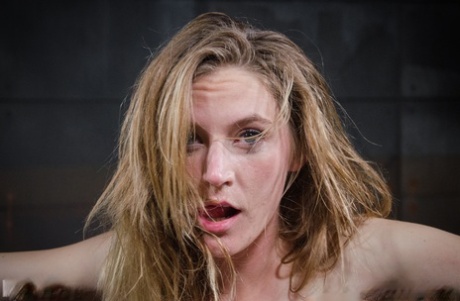 Thin white girl Mona Wales is affixed to metal poles for sexual servitude 33451615