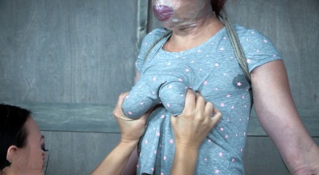 Restrained and gagged female is tortured and fucked by another woman 88133848