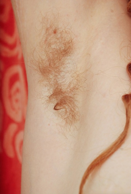 Hairy amateur with curly red hair exposes her clit in the bathroom 80412670