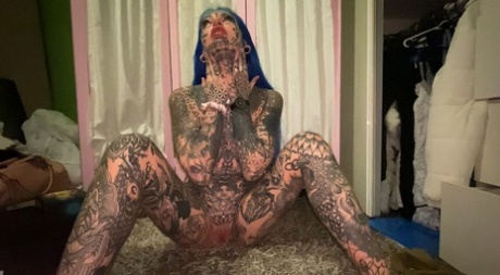 Alt girl shows her heavily inked body and tight pink pussy at once 91103227
