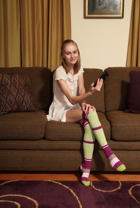 Adorable teen Alicia Williams takes a selfie before getting naked in OTK socks 34754300