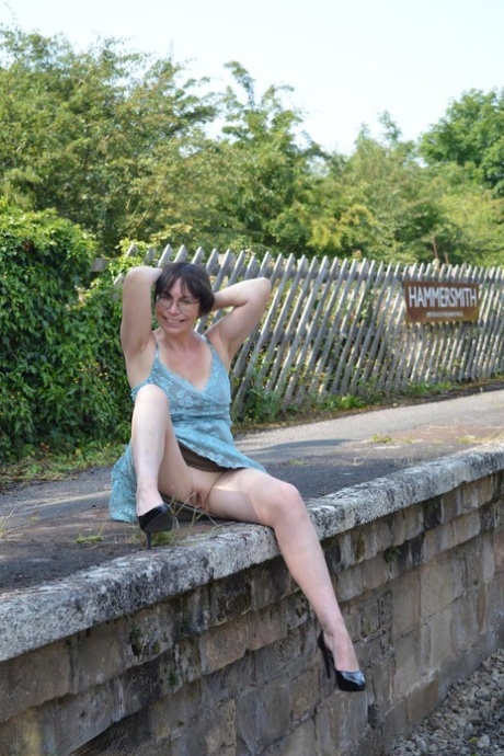 Mature amateur Barby Slut get naked in heels at an abandoned railway station 93974489