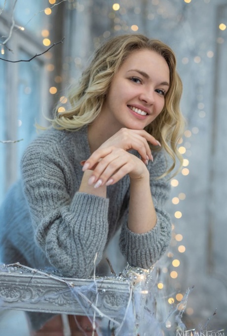 Young blonde Sophie Gem ditches a grey sweater for great nude poses 19351388