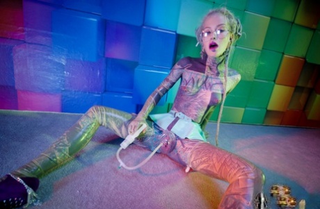Tattooed freak Anuskatzz masturbates with toys in cantilever heels 19922584