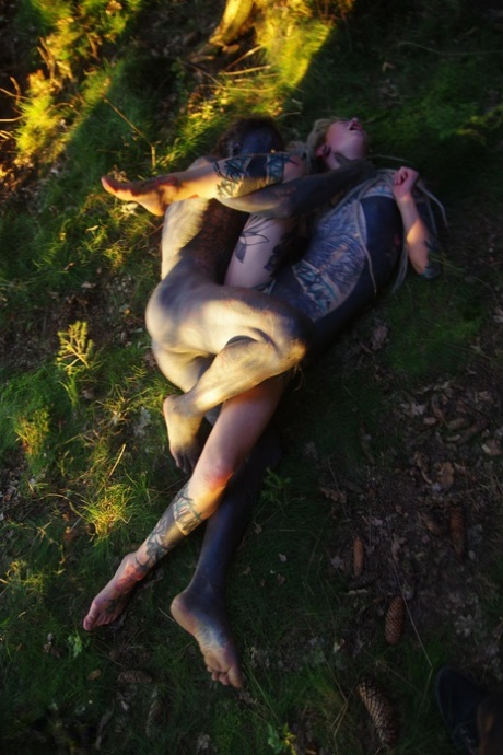 Tatted freaks Anuskatzz & Lily Lu have sexual intercourse on the forest floor 51529137