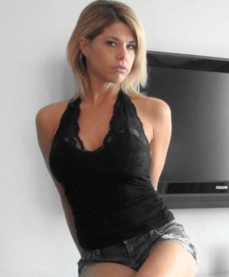 Blonde chick is silenced with gags while hogtied in denim cutoffs and heels 18354686