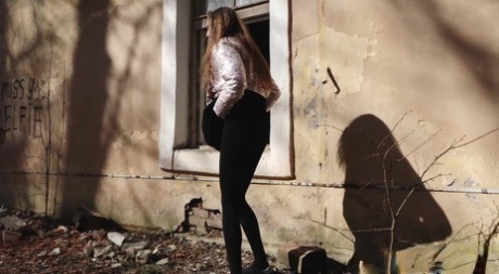 Short taken girl Vika squats for a piss behind a graffitied building 19724093