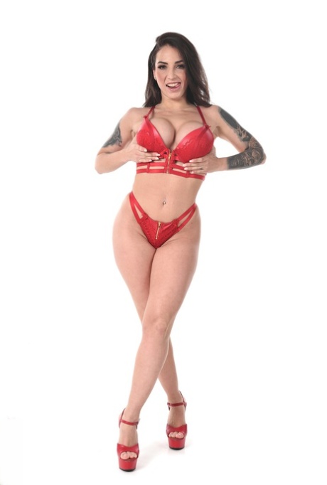 Tattooed brunette Medusa doffs red lingerie before dildoing her pussy 90069780