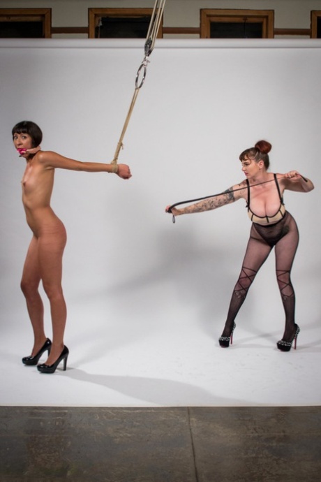 Brunette submissive Vivi Marie is topped by a busty lesbian 12844380