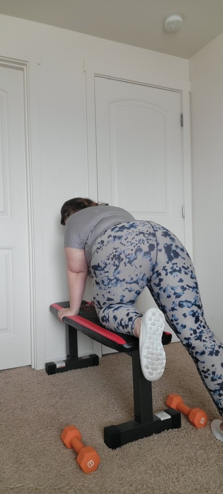Obese amateur Busty Kris Ann gets naked while working out at home 77650459