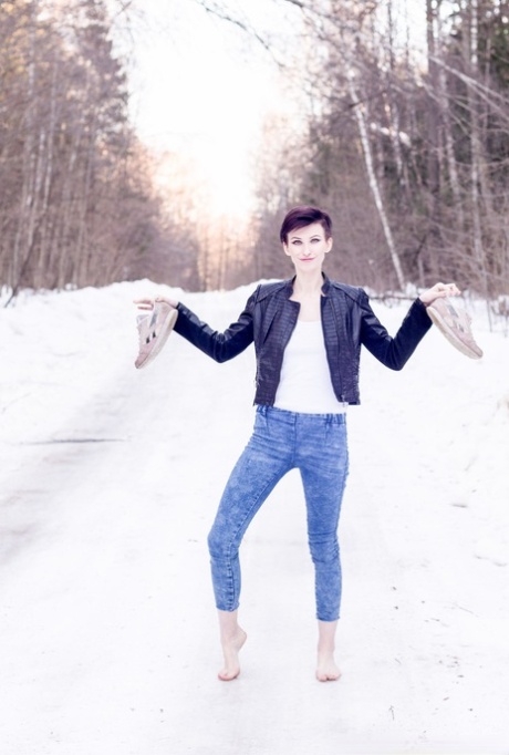 Skinny girl Claudia gets totally naked on a snow-covered road 70352055